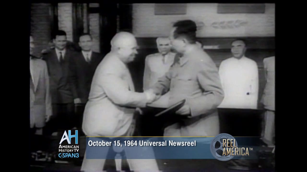 Black-and-white frame from the 1964 Universal News reel showing Nikita Khrushchev speaking in close-up.