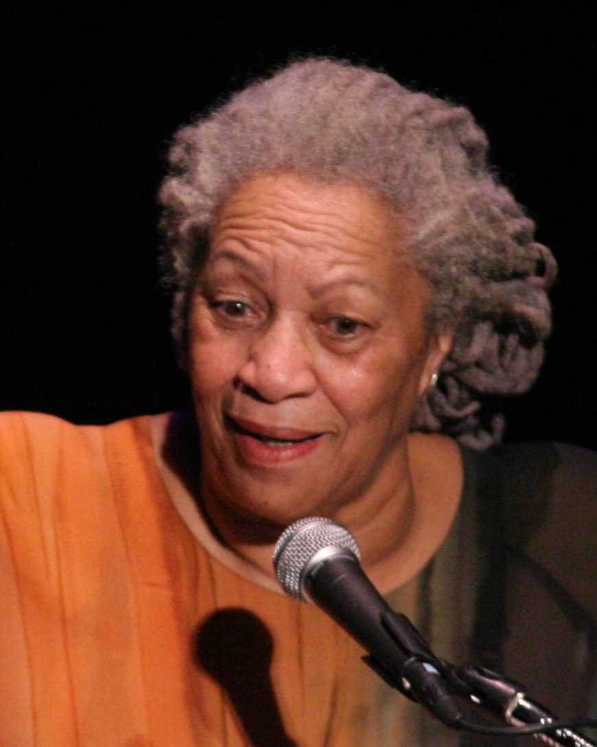A close-cropped 2008 photograph of Toni Morrison smiling while speaking at a public event.