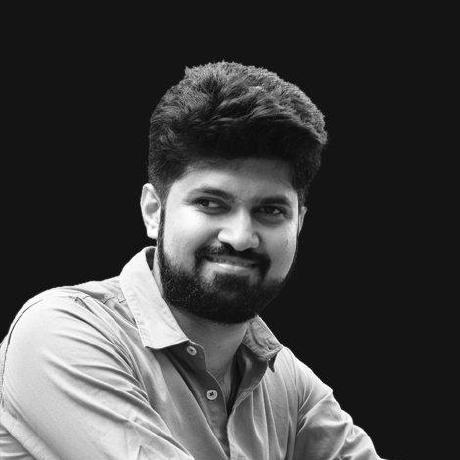 A black-and-white GitHub profile portrait of Bruno creator Anoop M D smiling toward the camera.