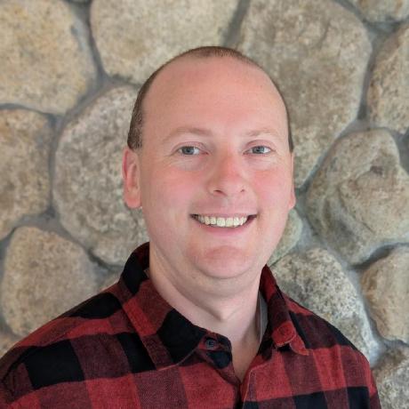 Andrew Gallant in a GitHub profile portrait, facing the camera with a dark background.