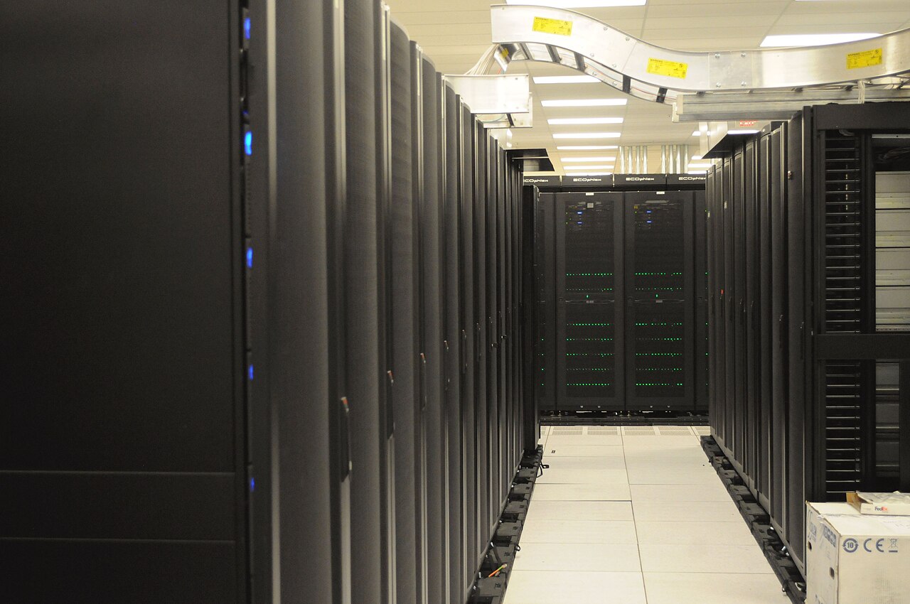 Photograph of server racks in a high-performance computing data center.