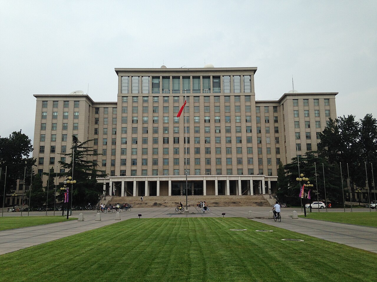 A real daylight photograph of the main building at Tsinghua University in Beijing.