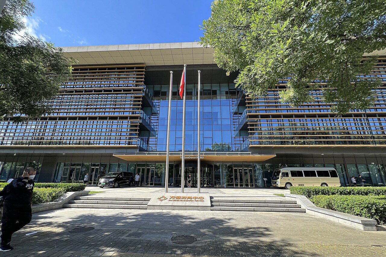 A Beijing office building facade with ByteDance markings photographed from street level.