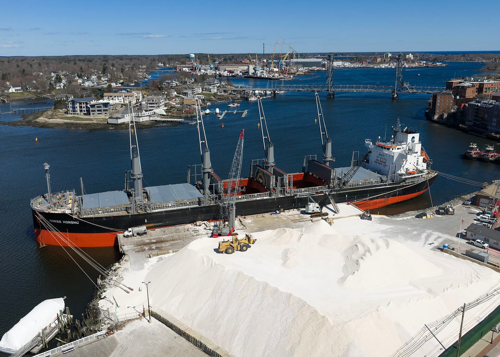 A bulk carrier unloading road salt at a New Hampshire terminal.