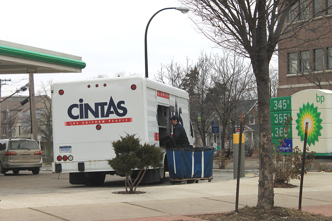 A white Cintas delivery truck parked on a street in Ann Arbor, Michigan.