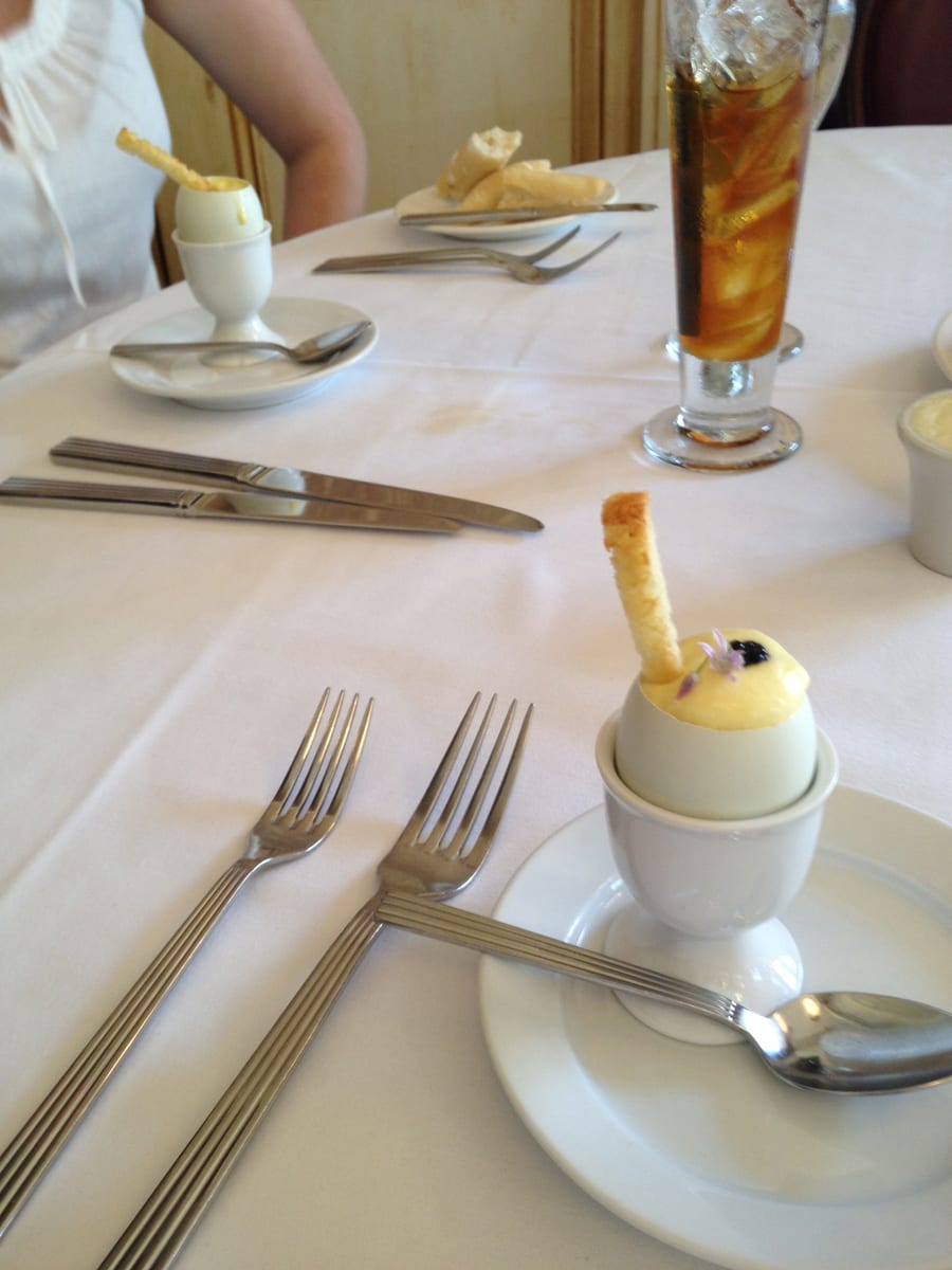 A truffled egg custard amuse-bouche with caviar and a crouton served at Restaurant August in New Orleans.