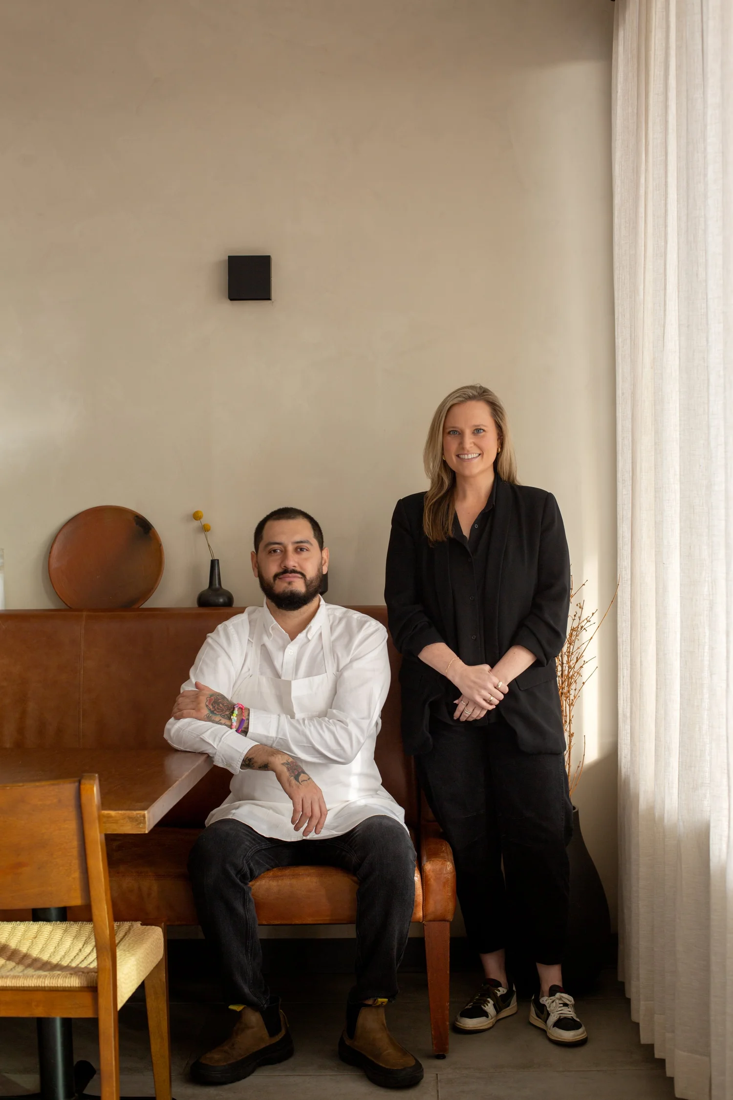 Chef Emmanuel Chavez and co-owner Megan Maul photographed inside Tatemó's dining room in Houston.
