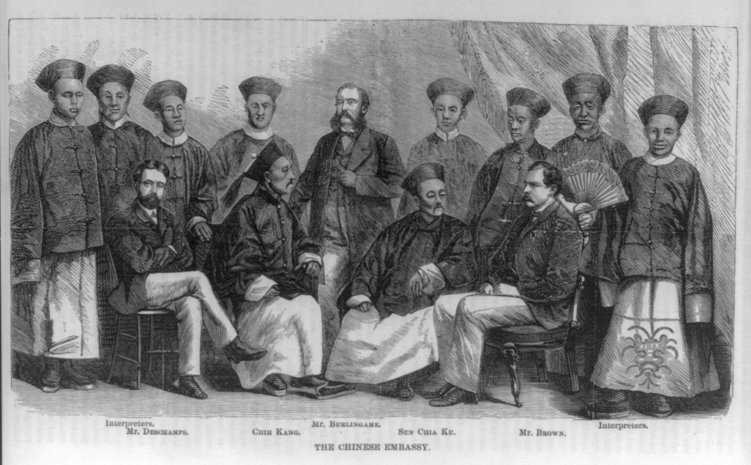 An 1868 Harper's Weekly engraving of the Chinese embassy, showing Qing envoys, Anson Burlingame, interpreters, and aides arranged in a formal group portrait.