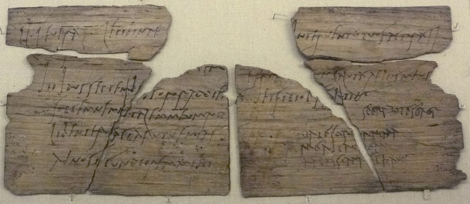 Photograph of Vindolanda tablet 291, a thin wooden Roman writing tablet with ink handwriting from Claudia Severa to Sulpicia Lepidina.