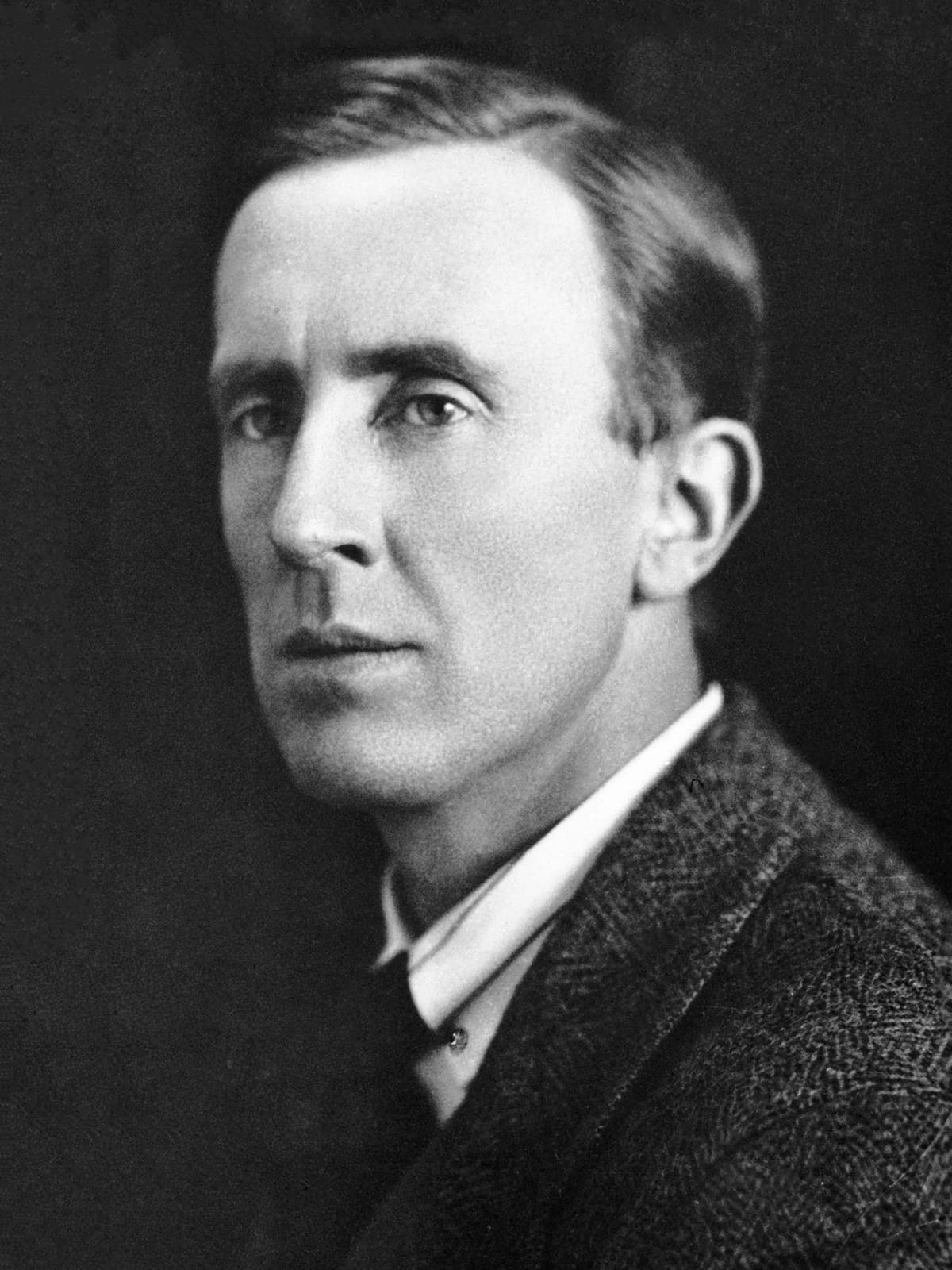 Black-and-white studio portrait of J. R. R. Tolkien, circa 1925.