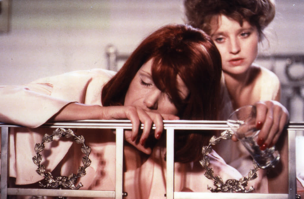 Still from The Bitter Tears of Petra von Kant showing Margit Carstensen and Hanna Schygulla inside Petra's lavish bedroom.