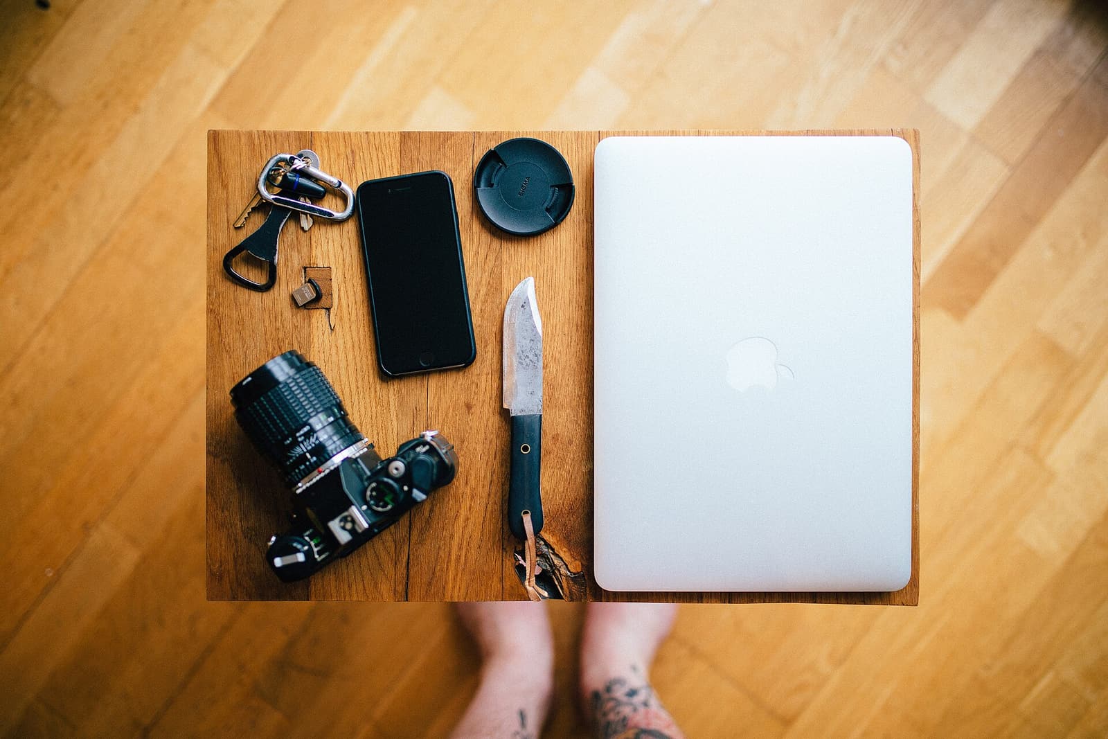 A camera and laptop on a tabletop, photographed in Bristol.