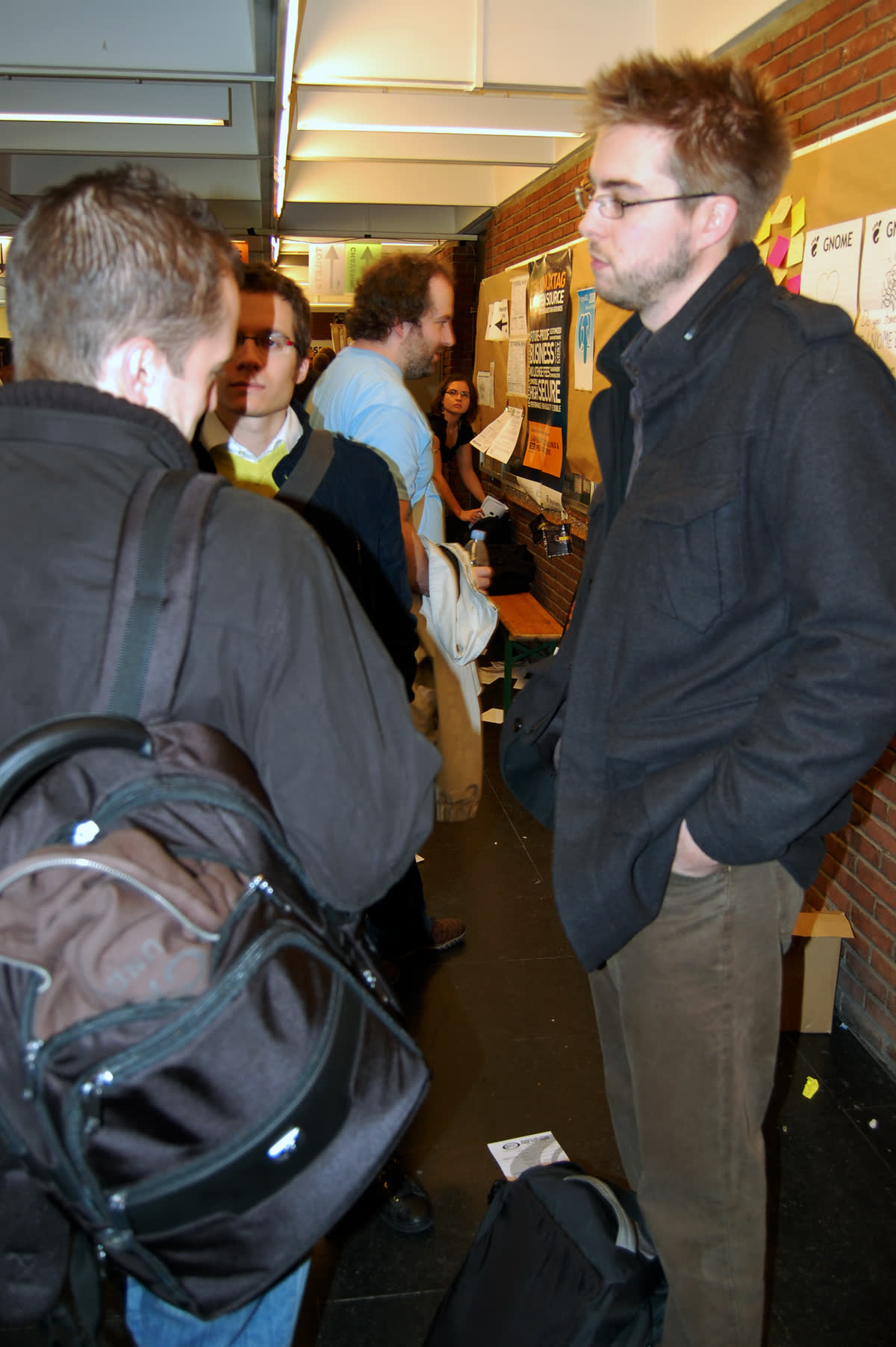 Drupal founder Dries Buytaert talks with community members at FOSDEM 2008.