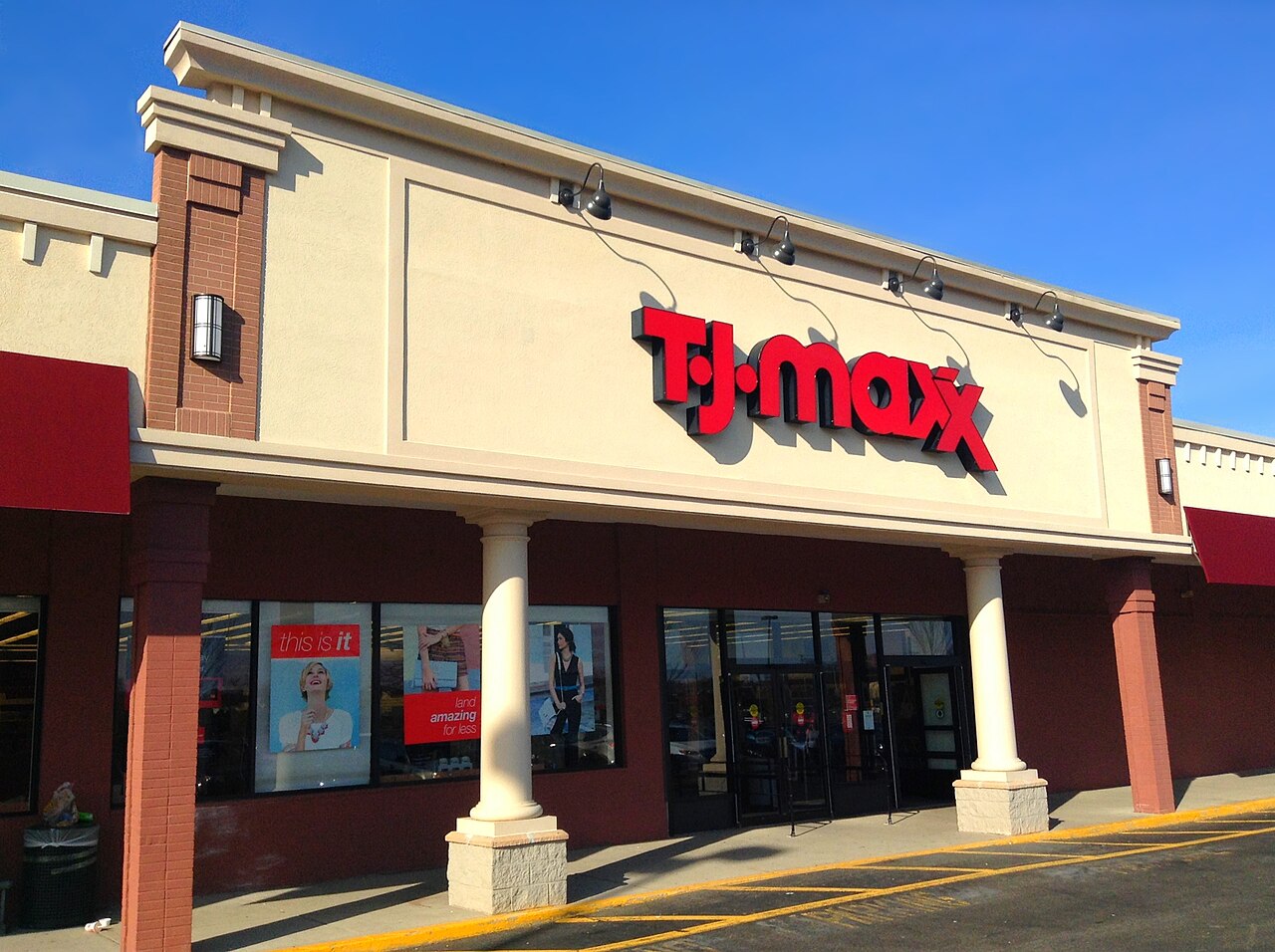 A T.J. Maxx storefront sign photographed from the parking lot.