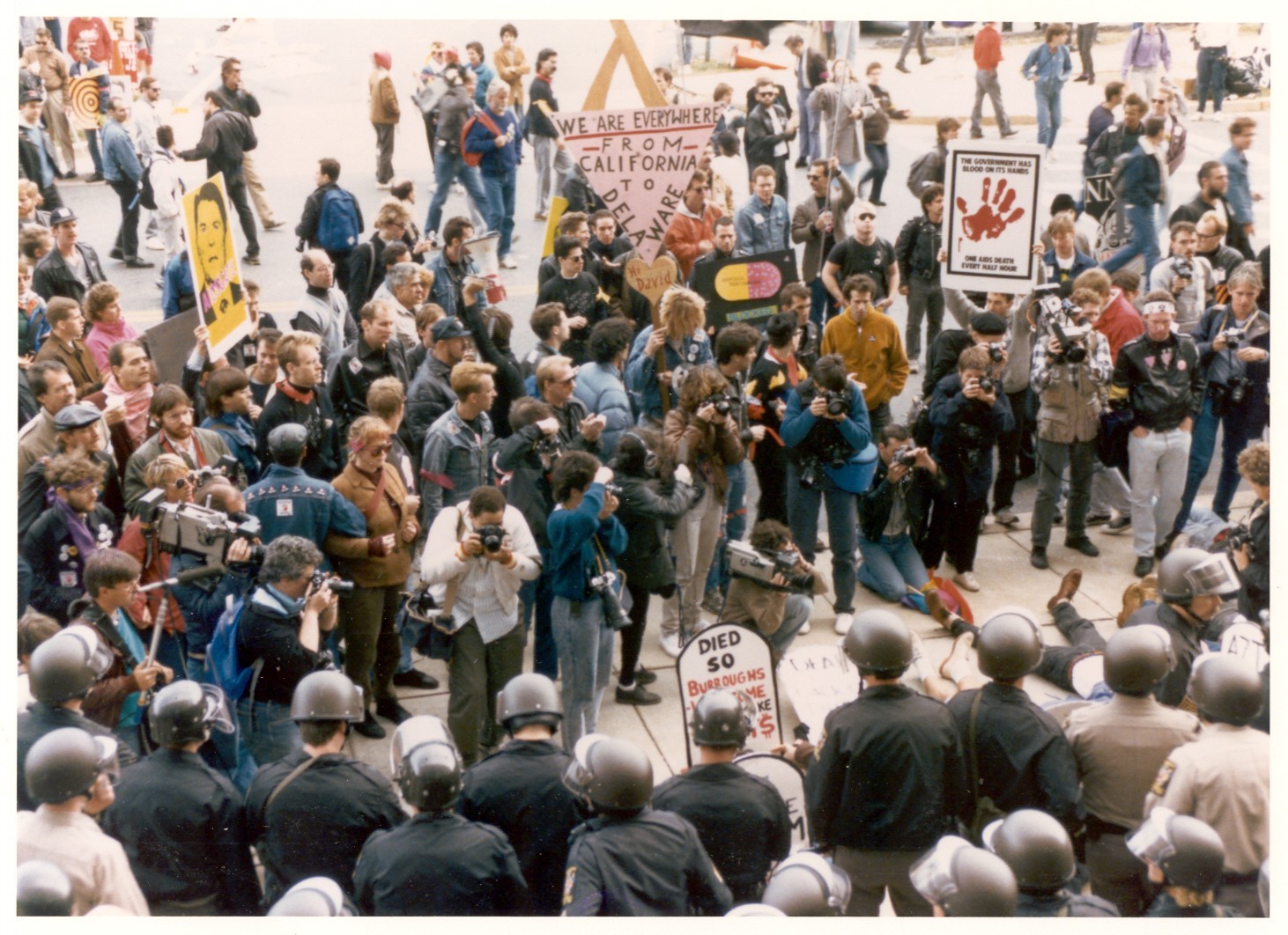 Archival color photograph of ACT UP demonstrators and police outside FDA headquarters during the 1988 AIDS protest.