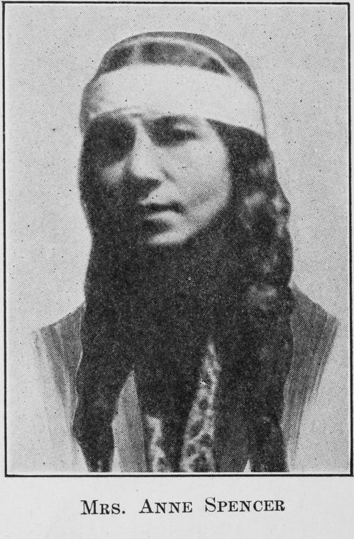 Archival black-and-white head-and-shoulders portrait of Anne Spencer wearing a light headband, circa 1923.