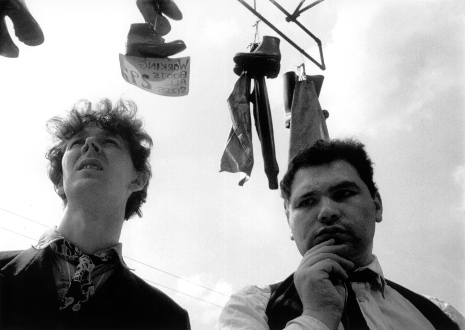 A black-and-white frame from Lorenza Mazzetti's Together showing its two dockworker protagonists in London's East End.