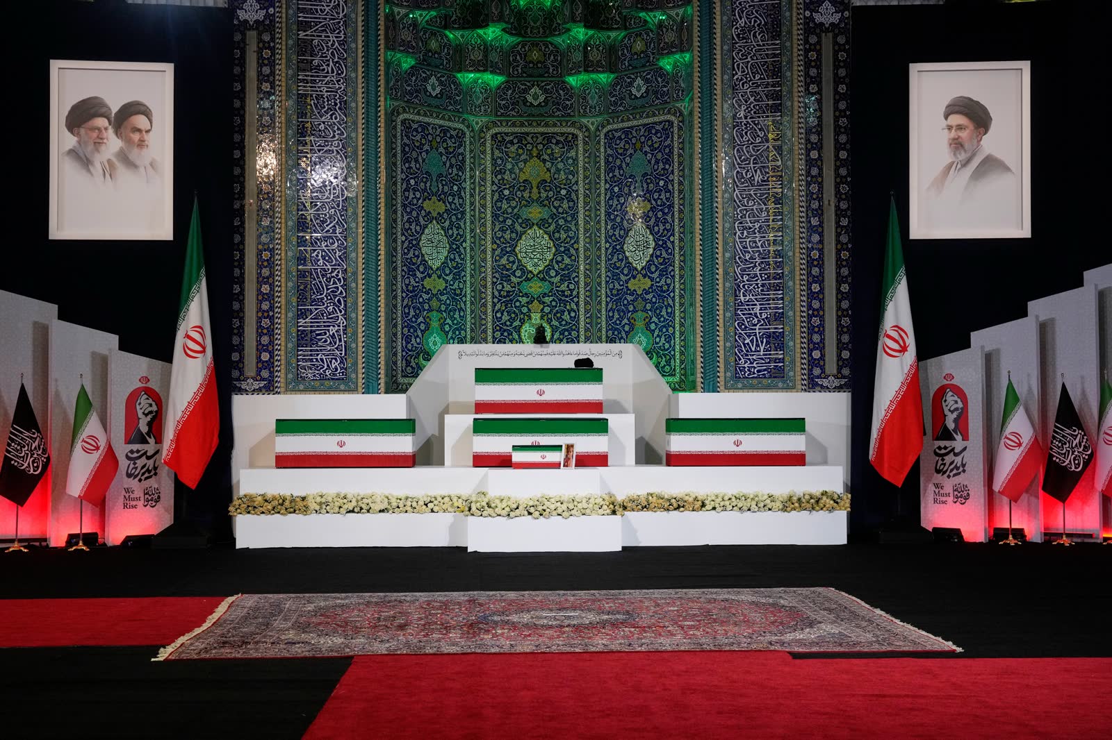 Coffins of Ali Khamenei and family members displayed at the Imam Khomeini Grand Mosalla in Tehran before funeral ceremonies.