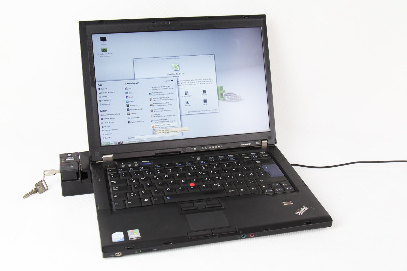 A ThinkPad T61 on a desk running Linux Mint, photographed in June 2016.