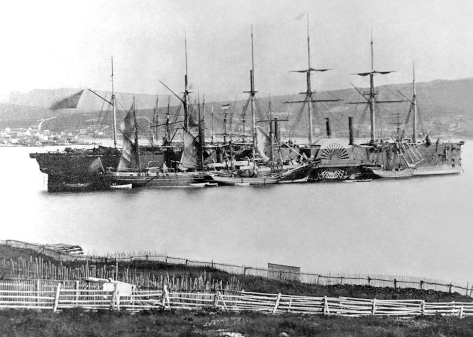 The steamship Great Eastern anchored among small boats at Heart's Content, Newfoundland, after laying the 1866 Atlantic cable.
