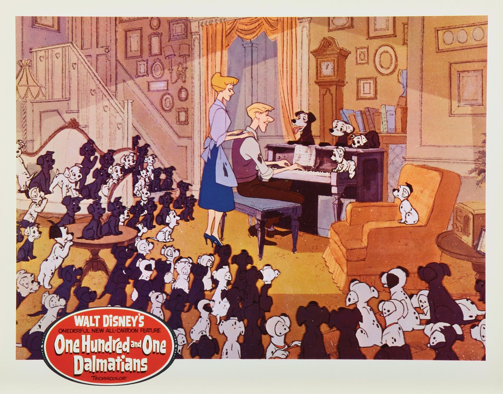 Archival 1961 promotional still for One Hundred and One Dalmatians showing Roger at the piano, Anita beside him, and dozens of black-and-white Dalmatians filling their London sitting room.
