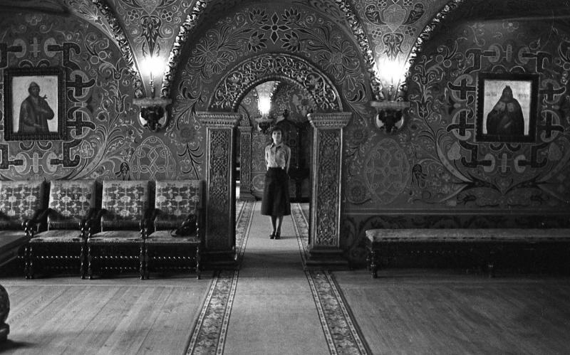 Film director Larisa Shepitko stands beneath a painted arch inside the Terem Palace of the Moscow Kremlin in May 1976.