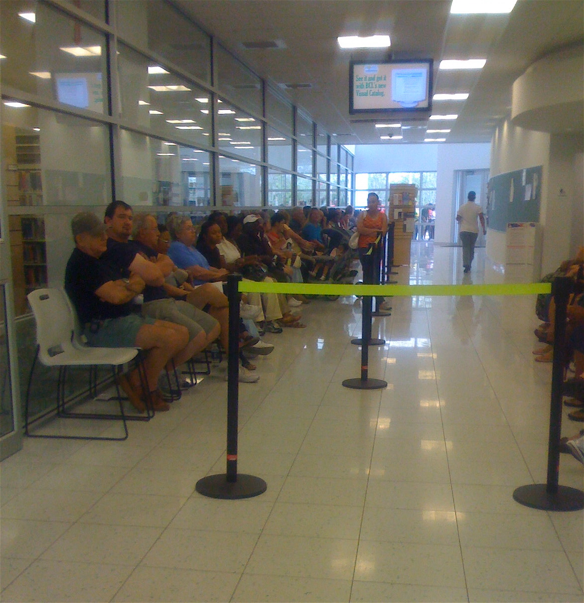 Voters seated in rows while waiting inside an early-voting location in Plantation, Florida.