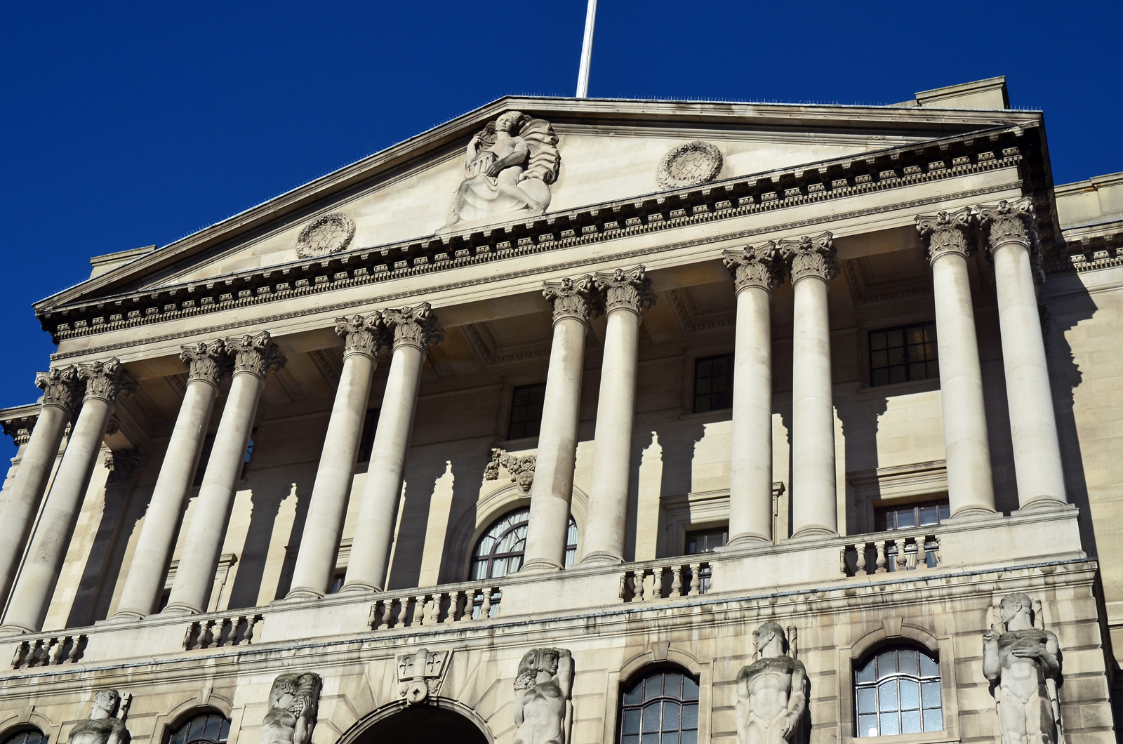 The Bank of England’s stone façade and columns on Threadneedle Street, London.