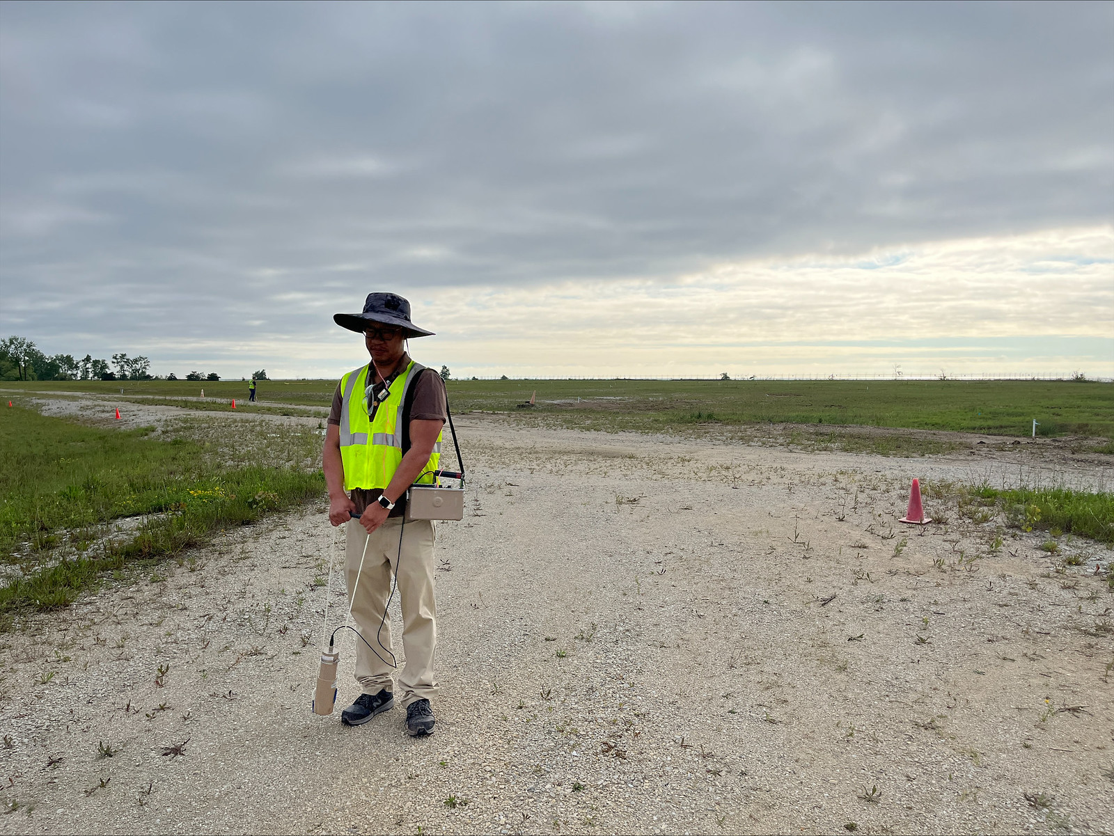 NRC inspector Bill Lin surveys exposed ground at the former Zion nuclear power plant.