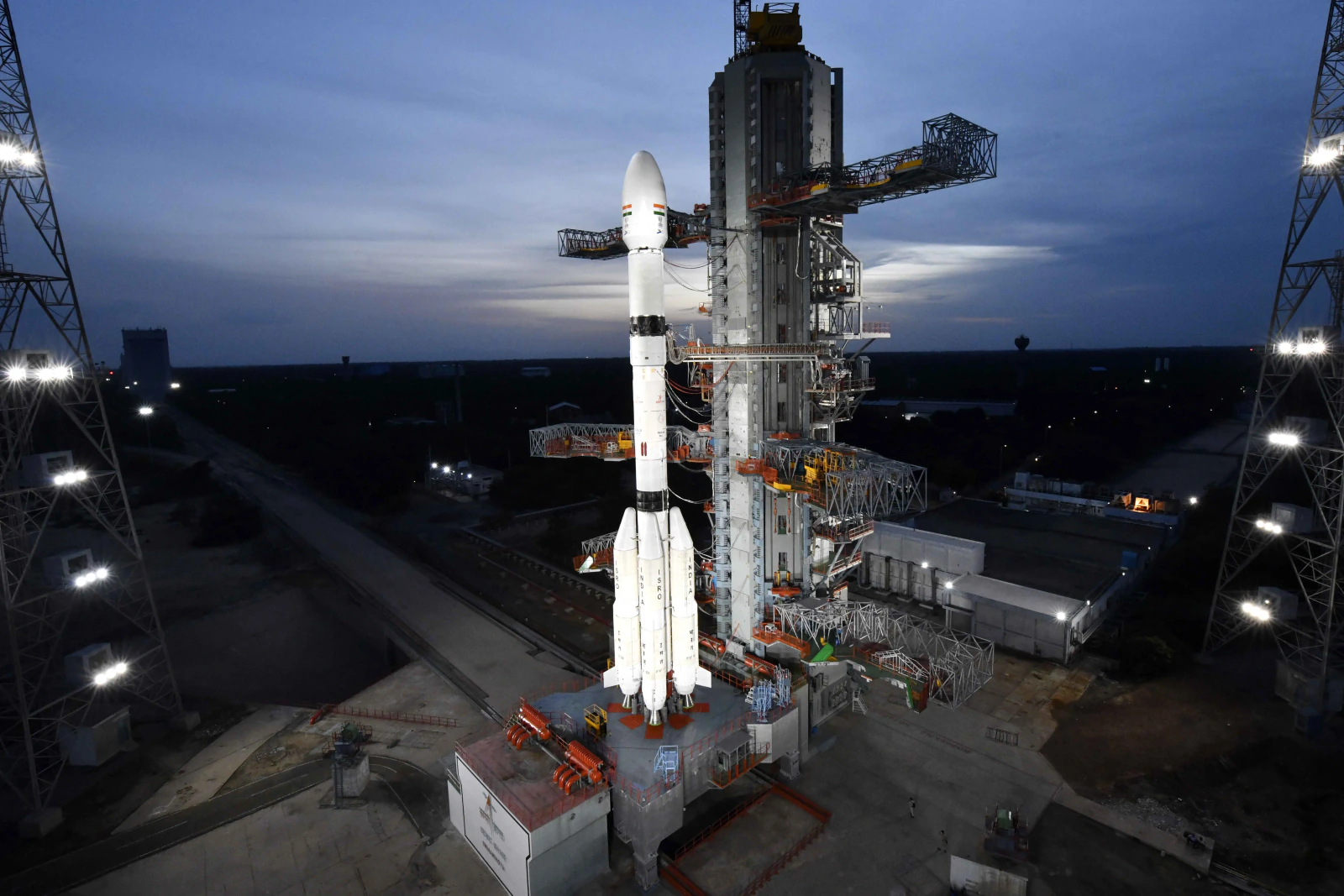 India's white GSLV-F17 rocket illuminated on its launch pad at Sriharikota before the EOS-05 mission.