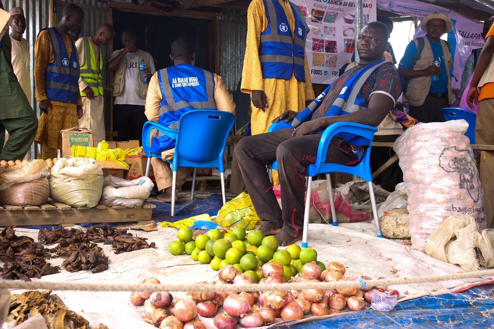 A retailer in Ngala displays the food available to families redeeming electronic vouchers.