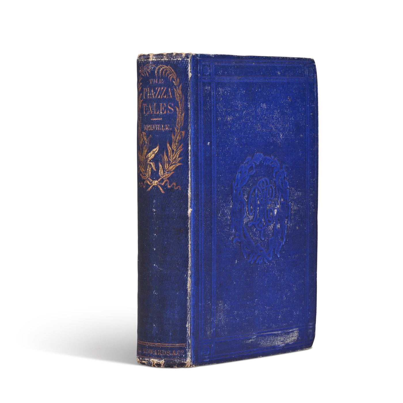 A worn blue cloth copy of Herman Melville's The Piazza Tales, with its spine and front cover visible.