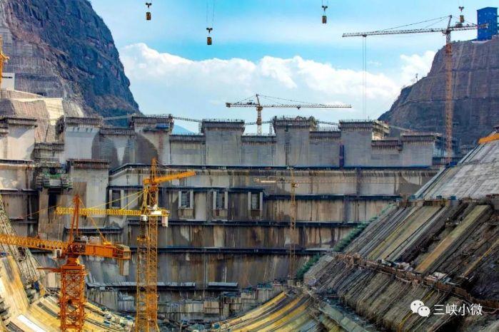 Baihetan dam under construction in the steep-sided Jinsha River valley.